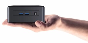 NUC mini PC in a hand emphasising it's compact design