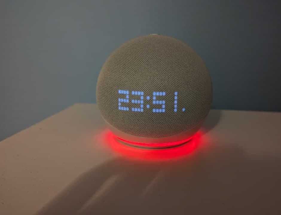 This Echo Dot with Alexa has a red light ring around the bottom of the speaker